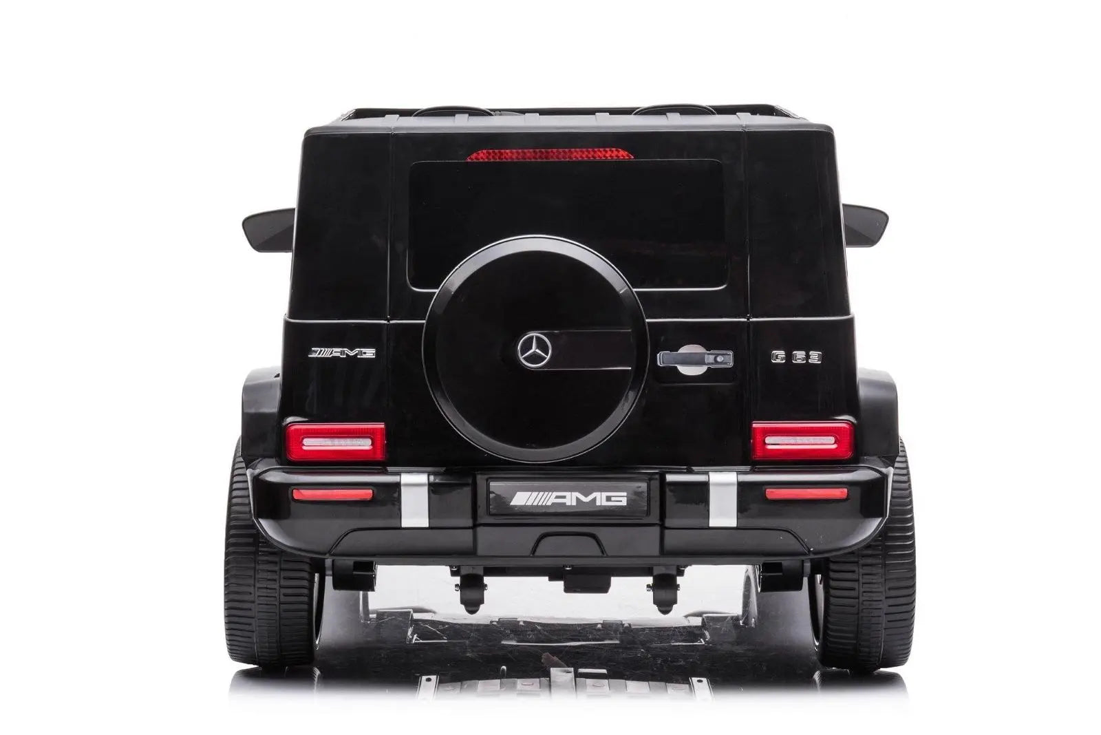 Rear view of black Mercedes G63 AMG ride-on toy car, detailed wheels and taillights