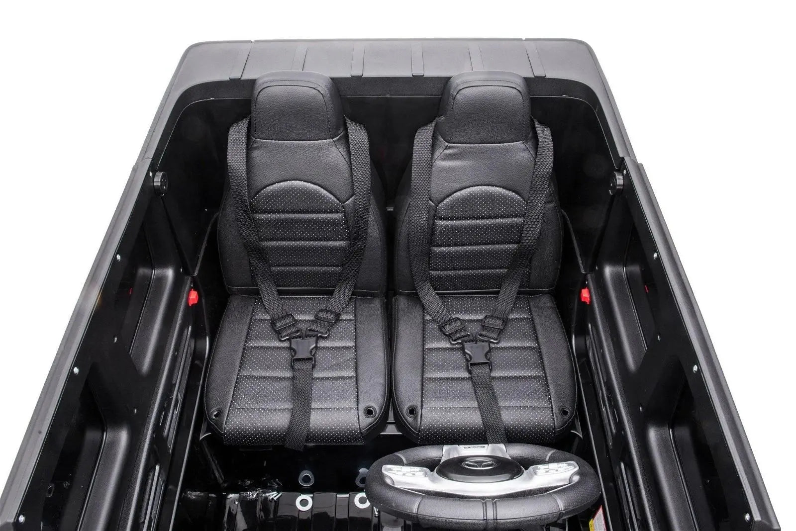 Two-seater black ride-on car interior with seatbelts and steering wheel