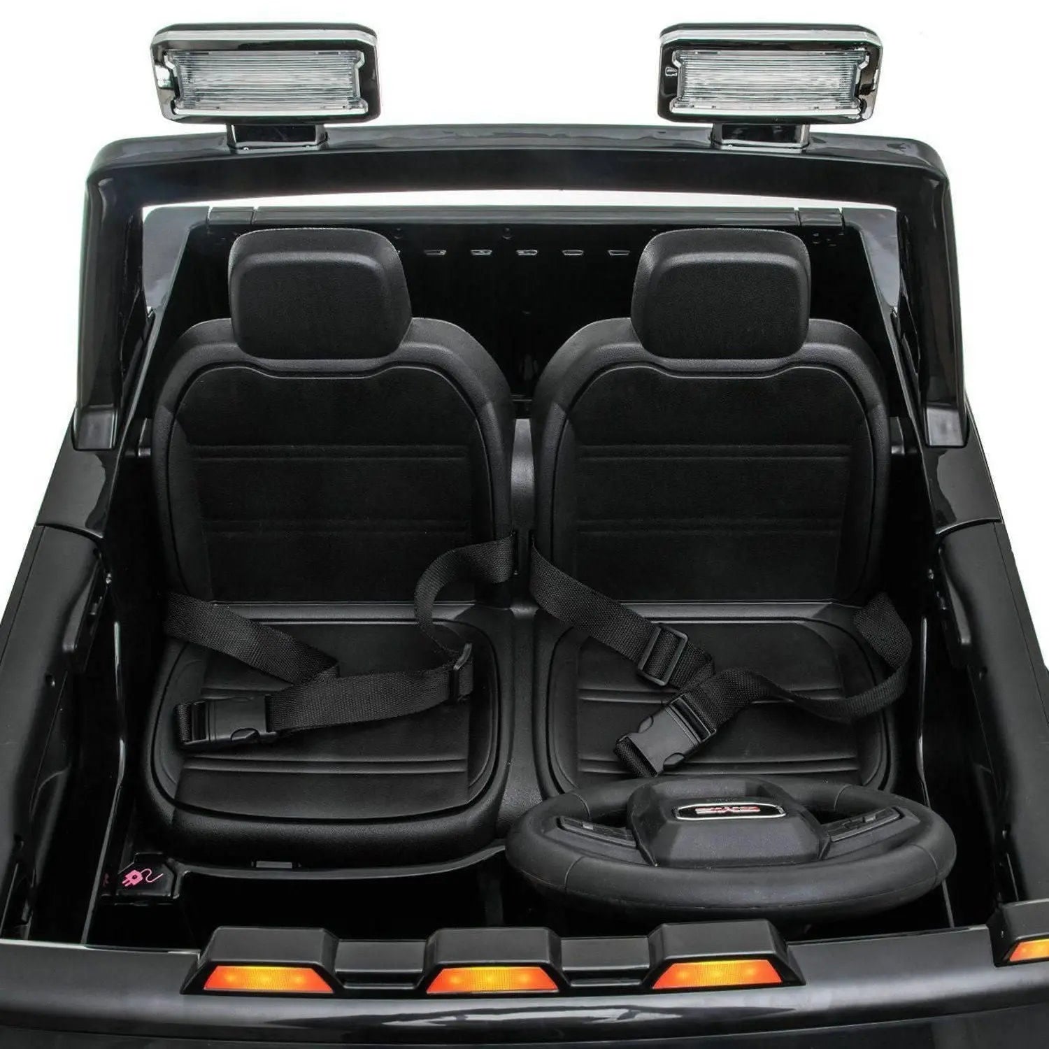 24V two-seater ride-on toy car interior with seat belts and steering wheel, black finish