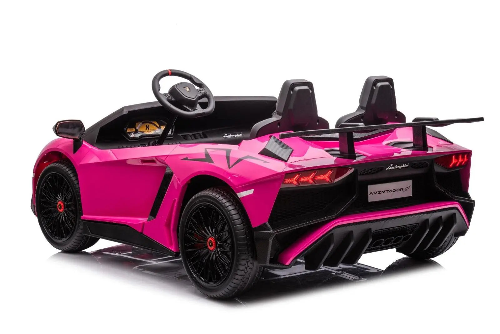 Pink two-seater Lamborghini Aventador ride-on toy car for kids with black wheels