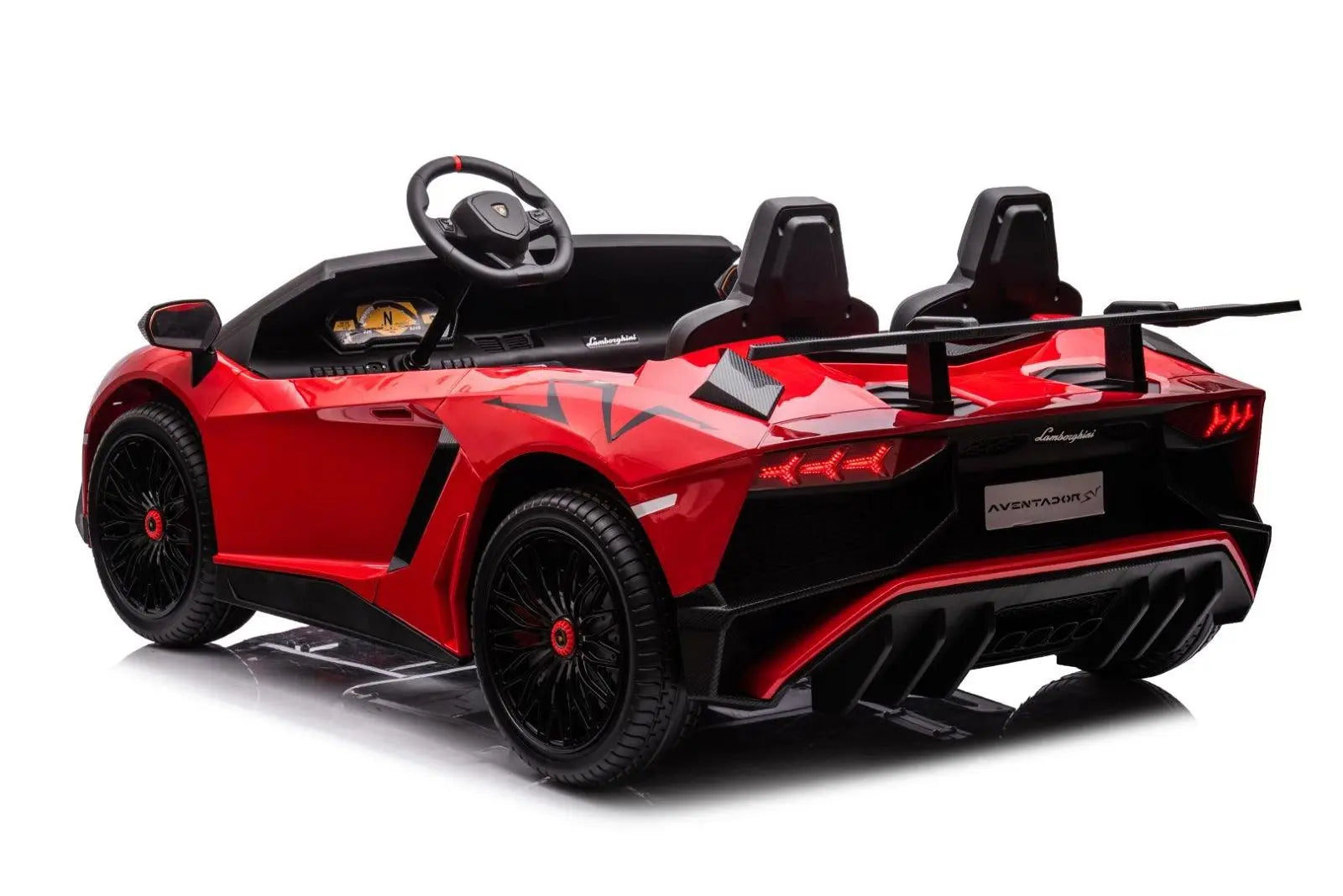 Red 2-seater ride-on Lamborghini Aventador car for kids with black wheels and rear spoiler