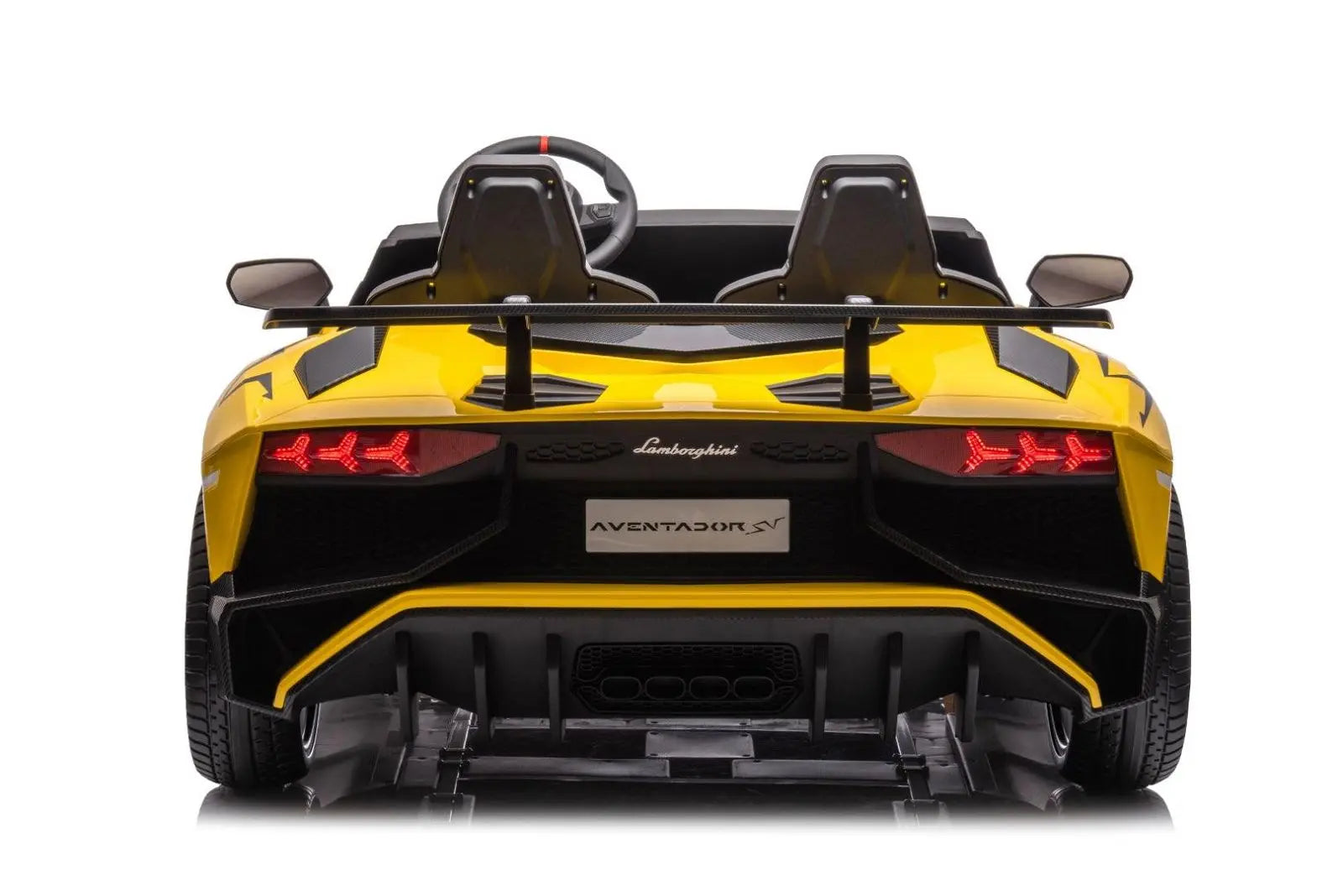 Yellow kids Lamborghini Aventador ride-on car, rear view, two seats, sports spoiler