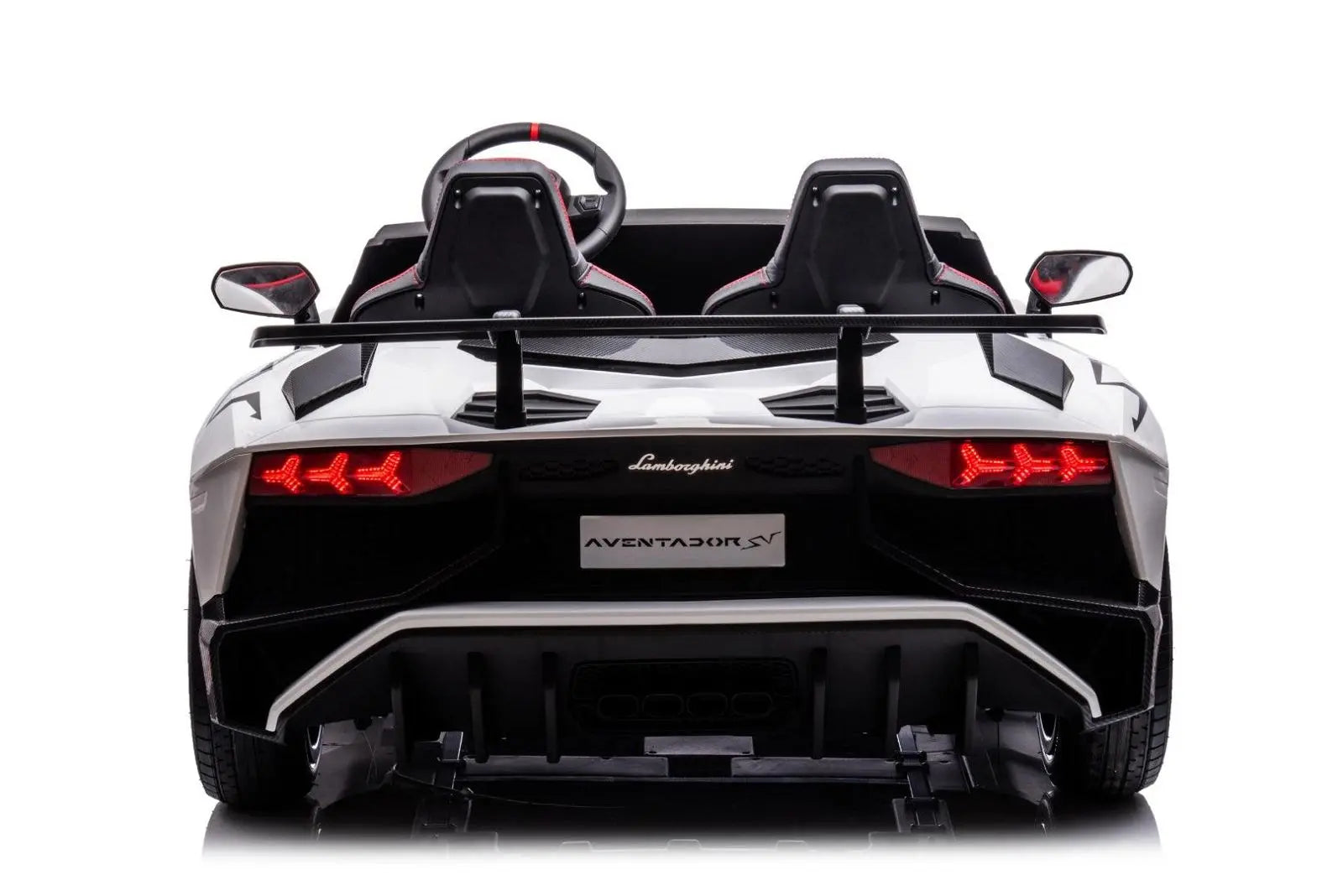 Rear view of white kids' 2-seater Lamborghini Aventador ride-on car with sporty details