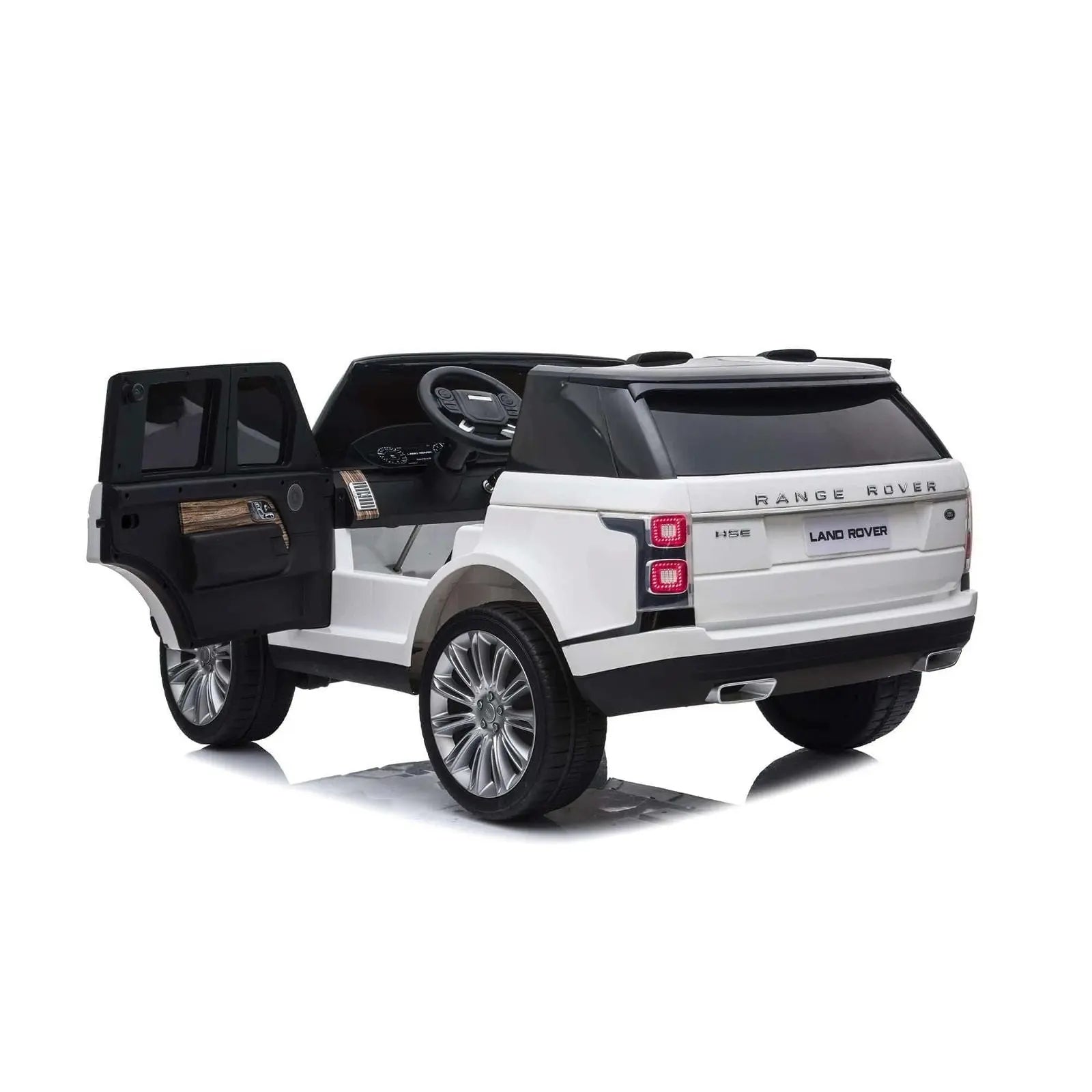 White 24V Range Rover HSE 2-seater ride-on toy car with open door, luxury details