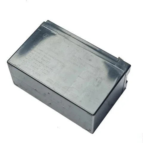 Rectangular metal capacitor box with engraved technical specifications on white background