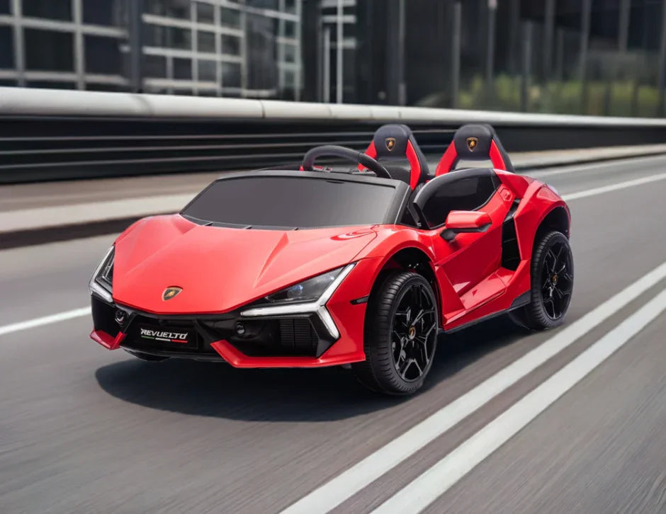 Red Lamborghini toy car for kids with two seats on a city street, model Revuelto.