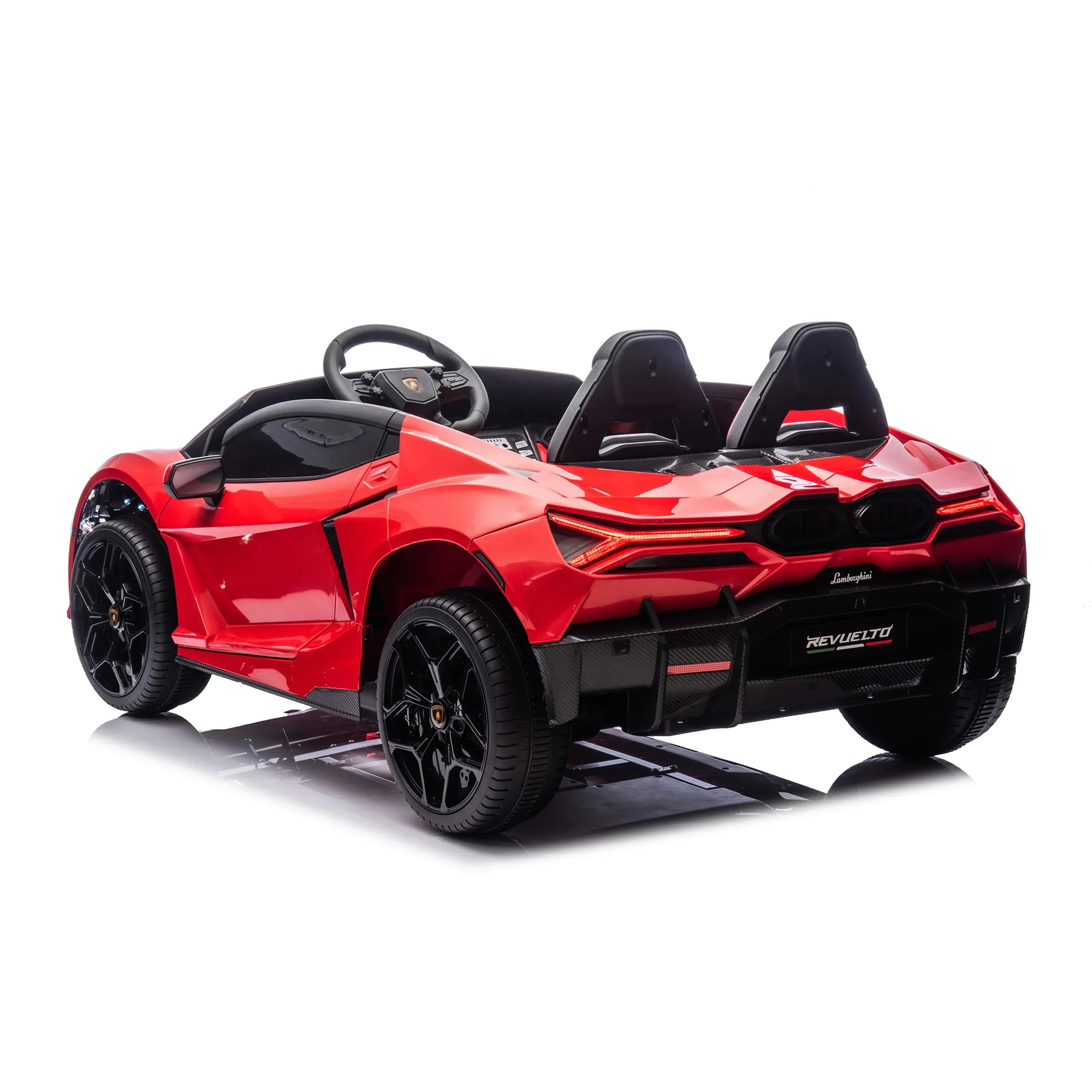 Red kids ride-on Lamborghini toy car with black wheels and dual seats on white background