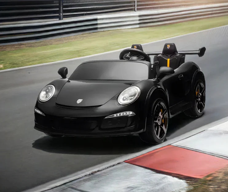 Black kids electric ride-on sports car on a racetrack, realistic design, luxury toy car