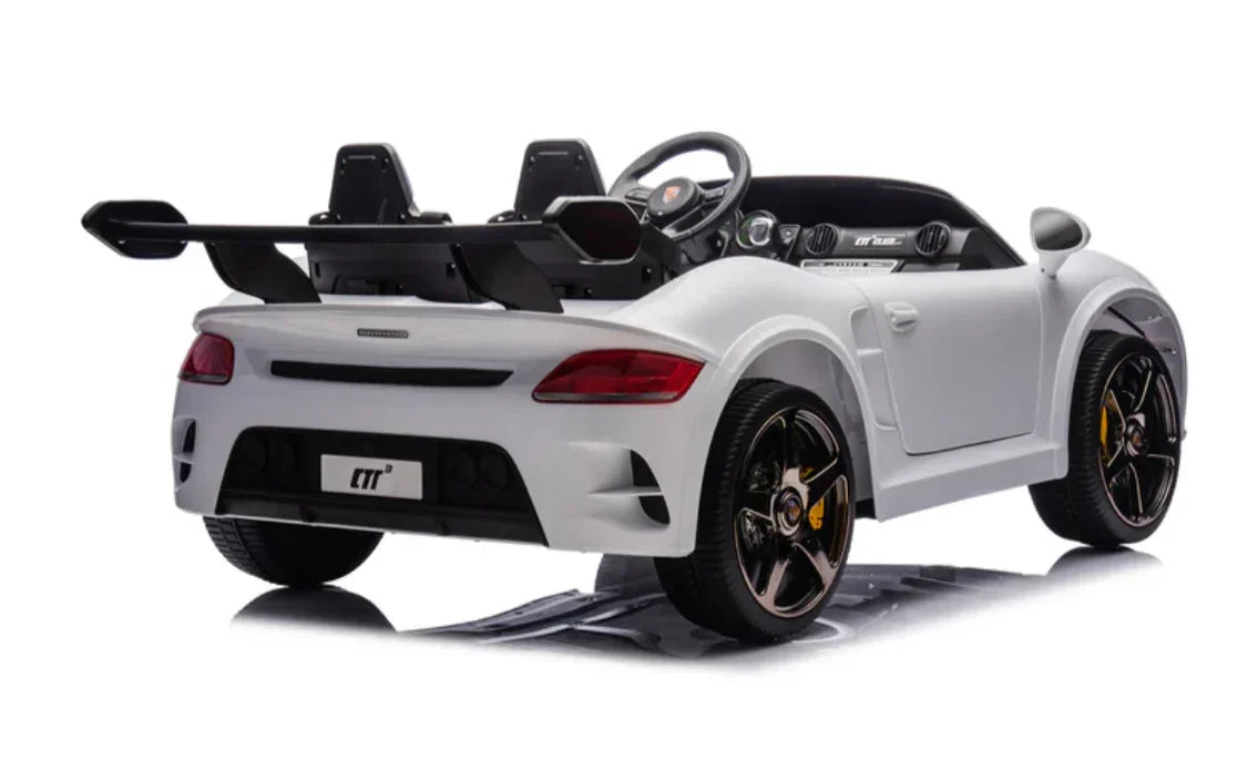 White kids electric ride-on sports car with spoiler and two seats on white background