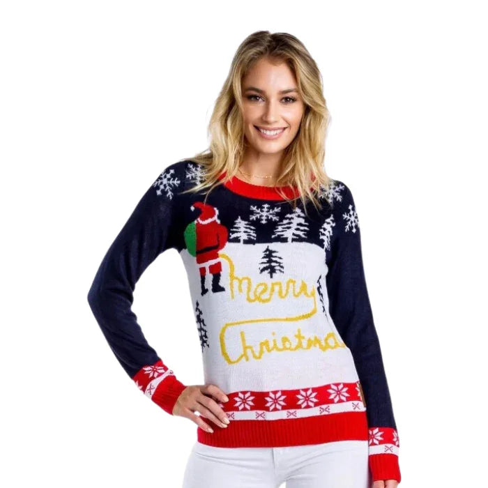 Woman wearing a navy blue ugly Christmas sweater with Santa, snowflakes, and Merry Christmas text