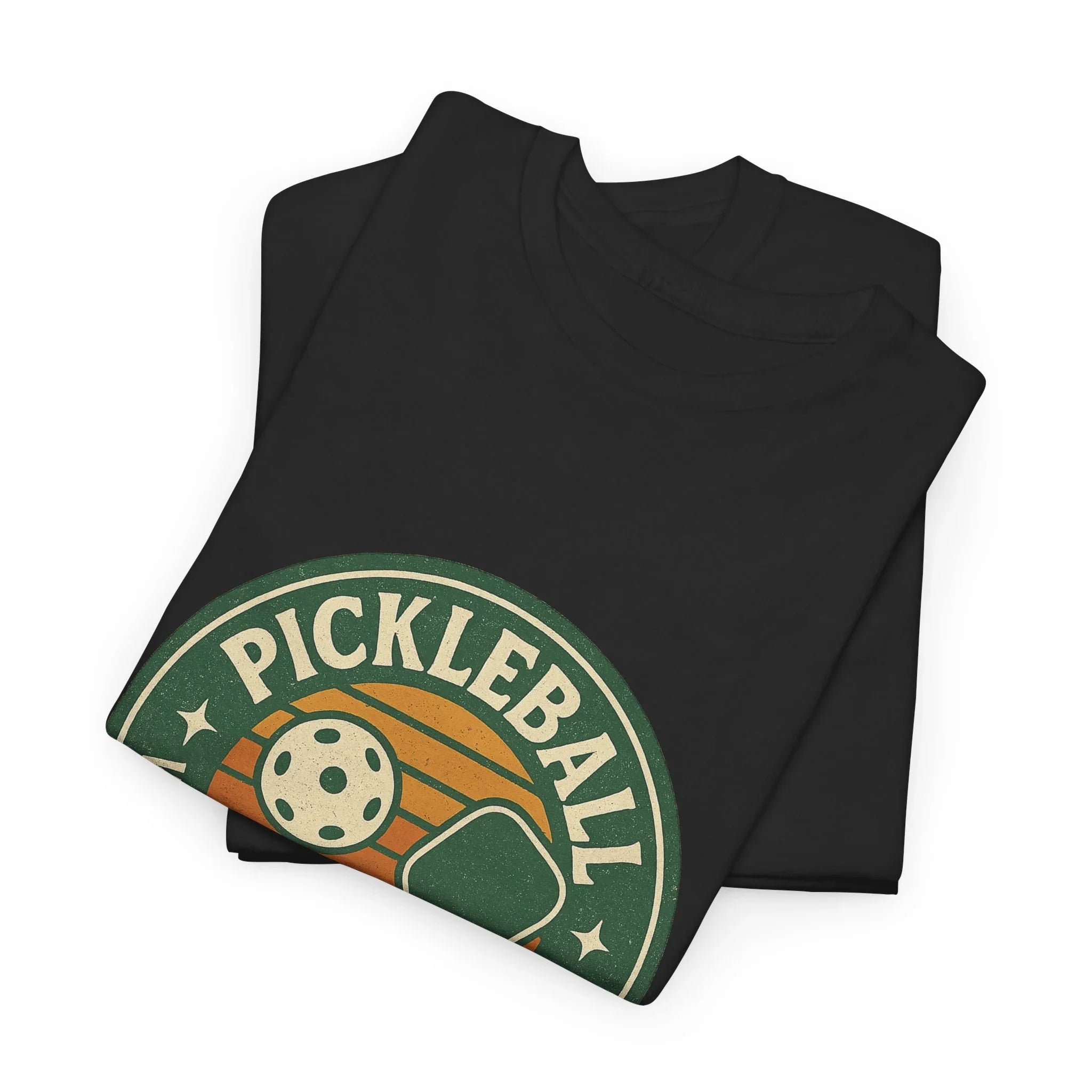 Folded black pickleball graphic t-shirts with retro paddle and ball design