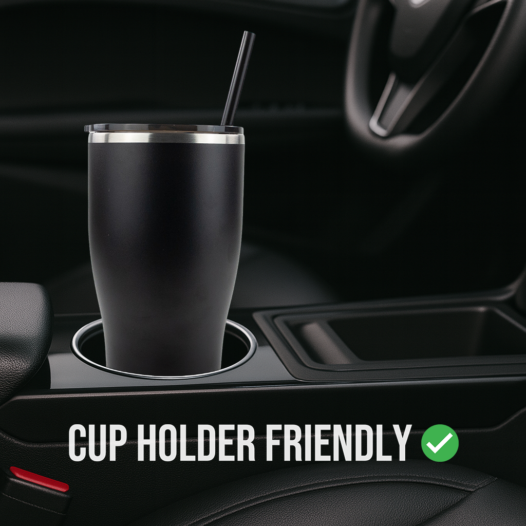 Black insulated tumbler with straw in a car cup holder, cup holder friendly text overlay