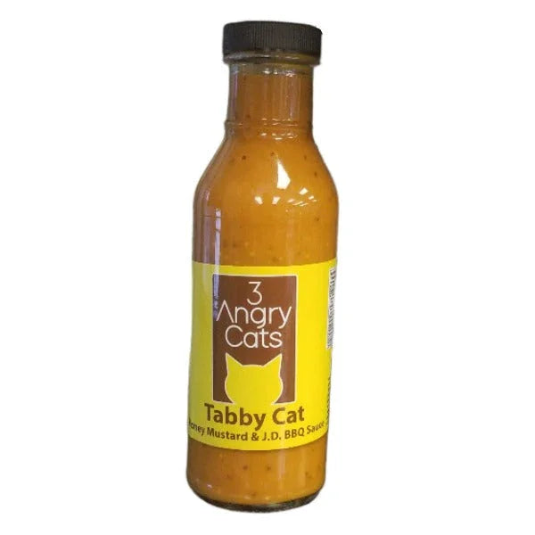 Bottle of 3 Angry Cats Tabby Cat honey mustard BBQ sauce with yellow label