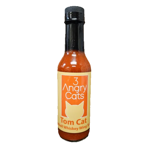 3 Angry Cats Tom Cat hot sauce bottle with orange label and black cap, outdoor cooking accessory