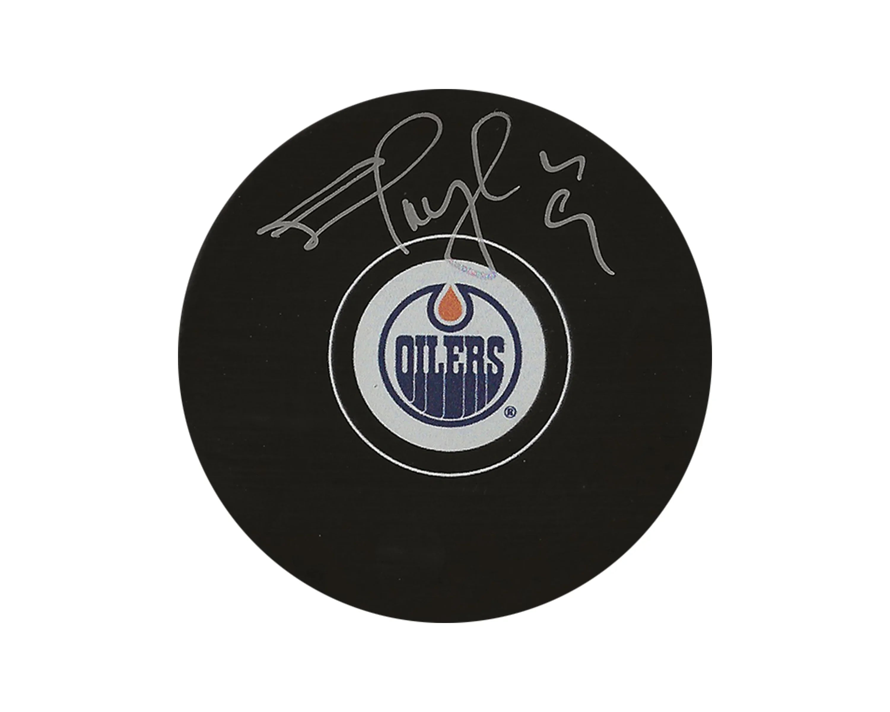 Signed hockey puck with Edmonton Oilers logo on white background