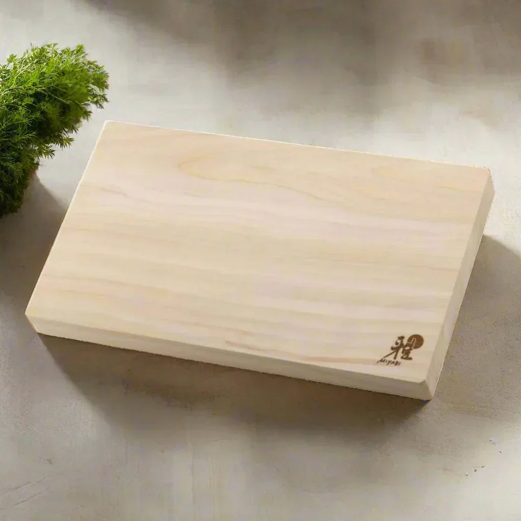Rectangular wooden cutting board with smooth finish on kitchen counter