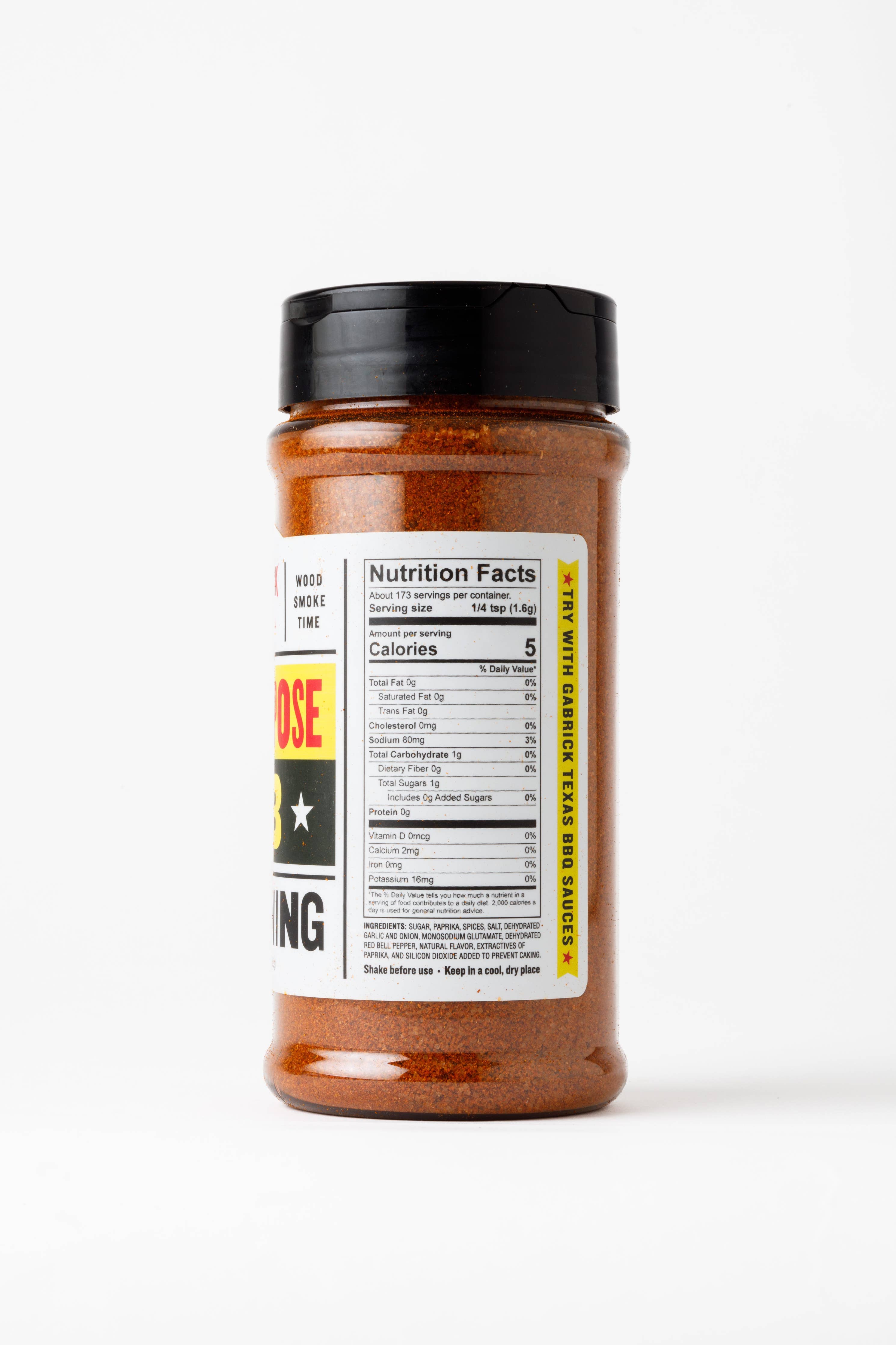BBQ seasoning spice rub bottle with nutrition facts and black lid on white background