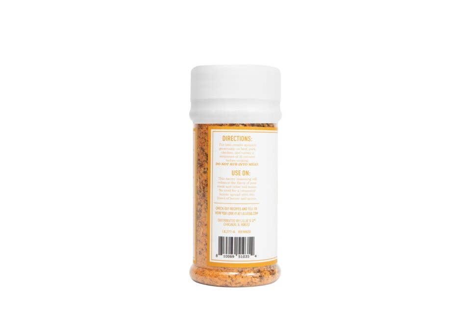 Back view of spice seasoning bottle with label and barcode on white background
