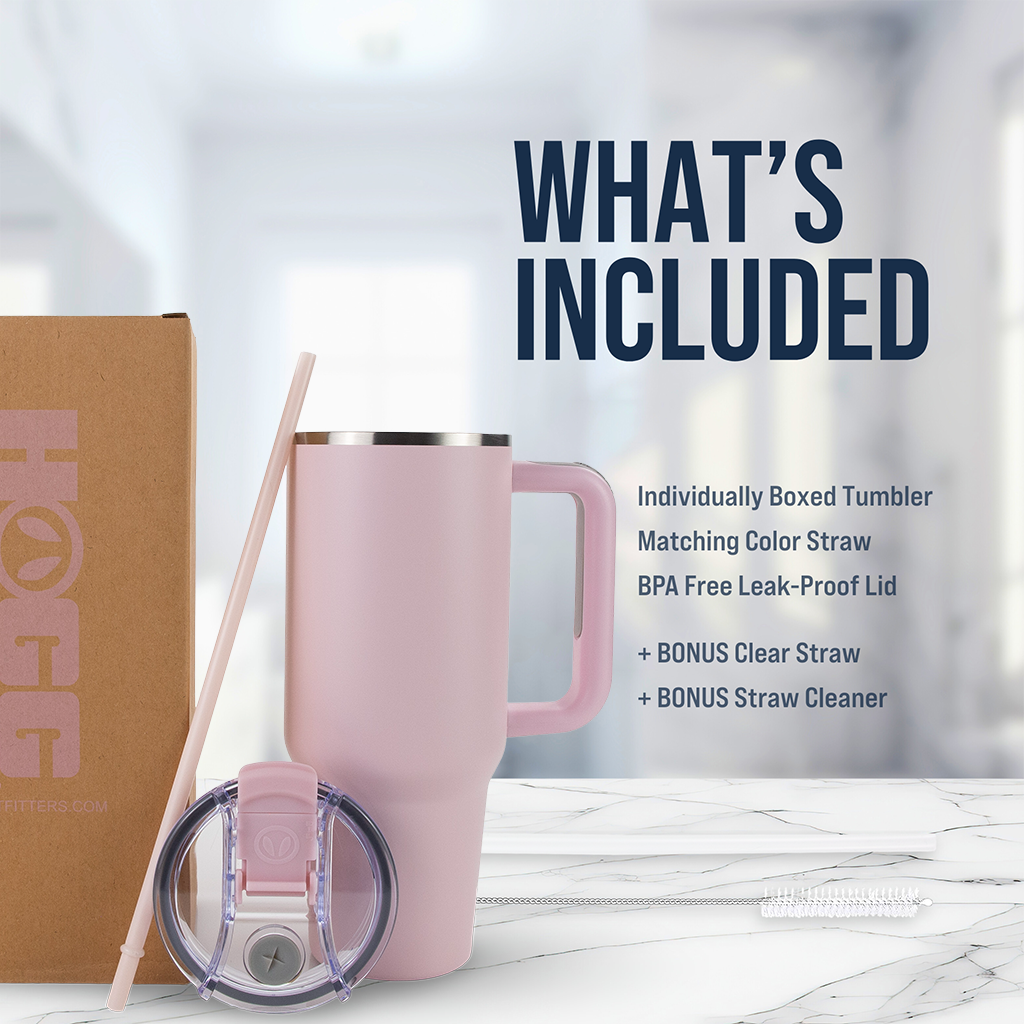 Pink insulated tumbler with handle, straw, leak-proof lid, straw cleaner, and box on marble surface