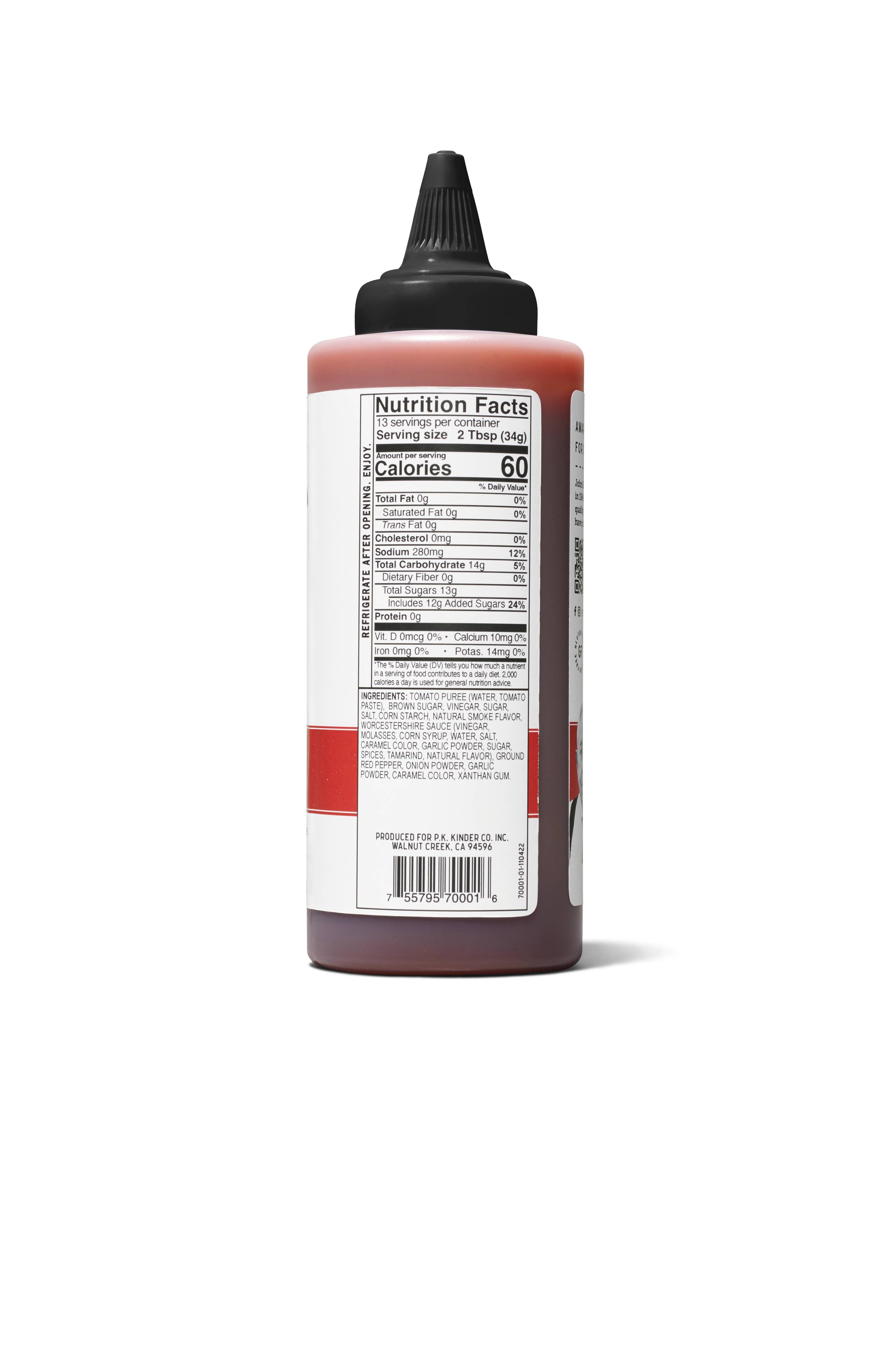 Squeeze bottle of sauce with nutrition facts label and black twist cap, isolated on white