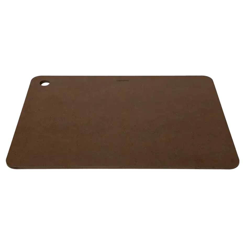 Brown rectangular cutting board with rounded edges and a corner hole, isolated on black