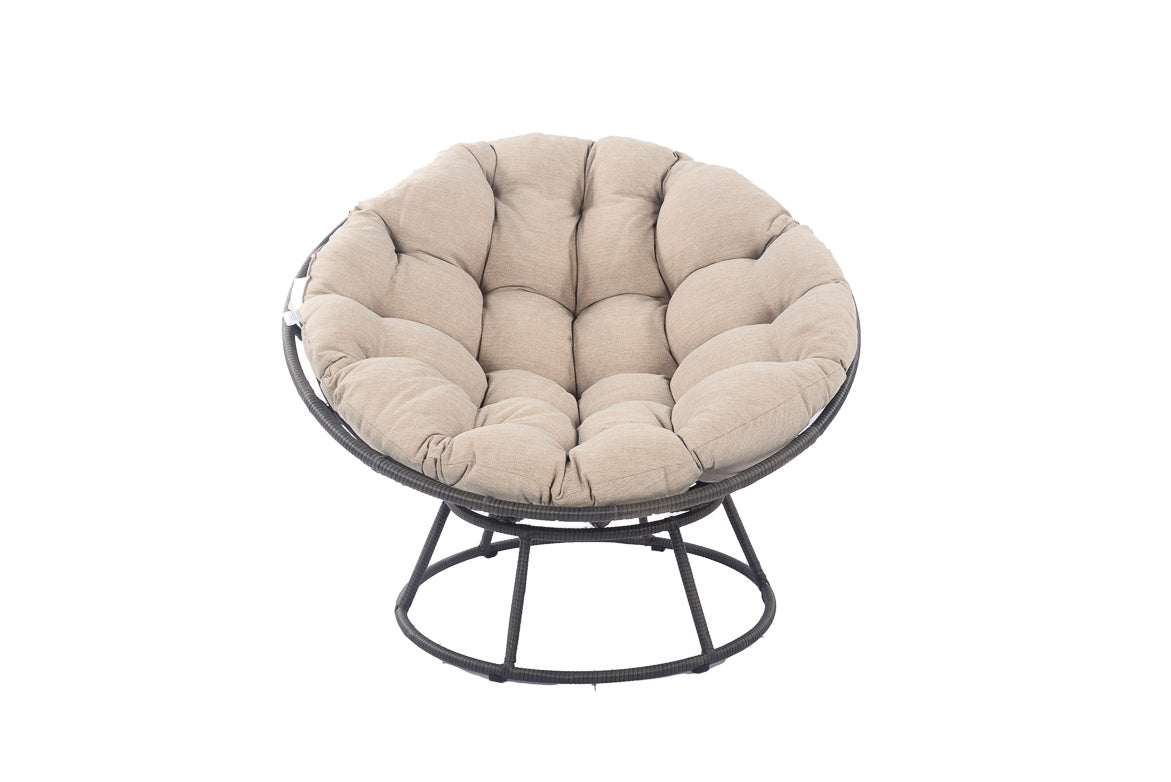Round outdoor papasan chair with beige tufted cushion and metal base
