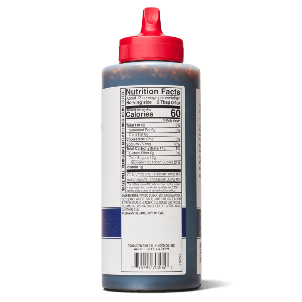 Close-up of sauce bottle with red cap showing nutrition facts and ingredients label