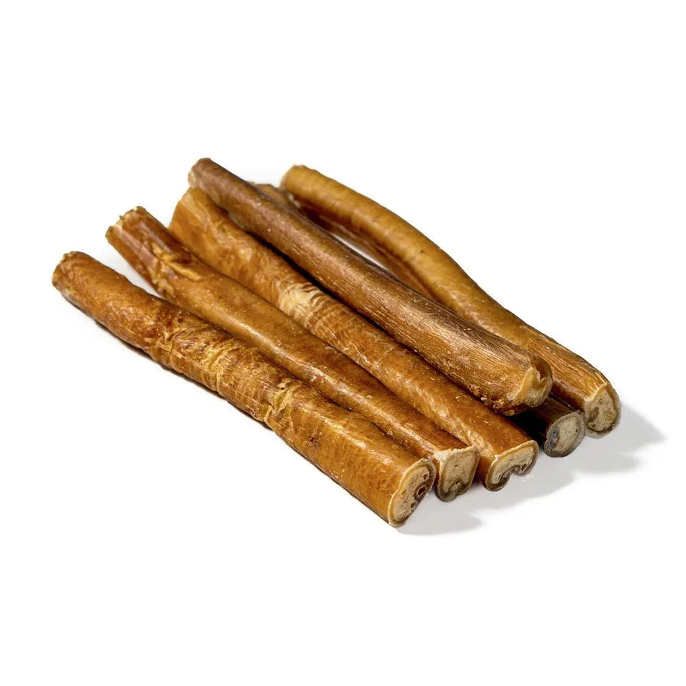 Six jumbo bully sticks dog chews arranged on a white background