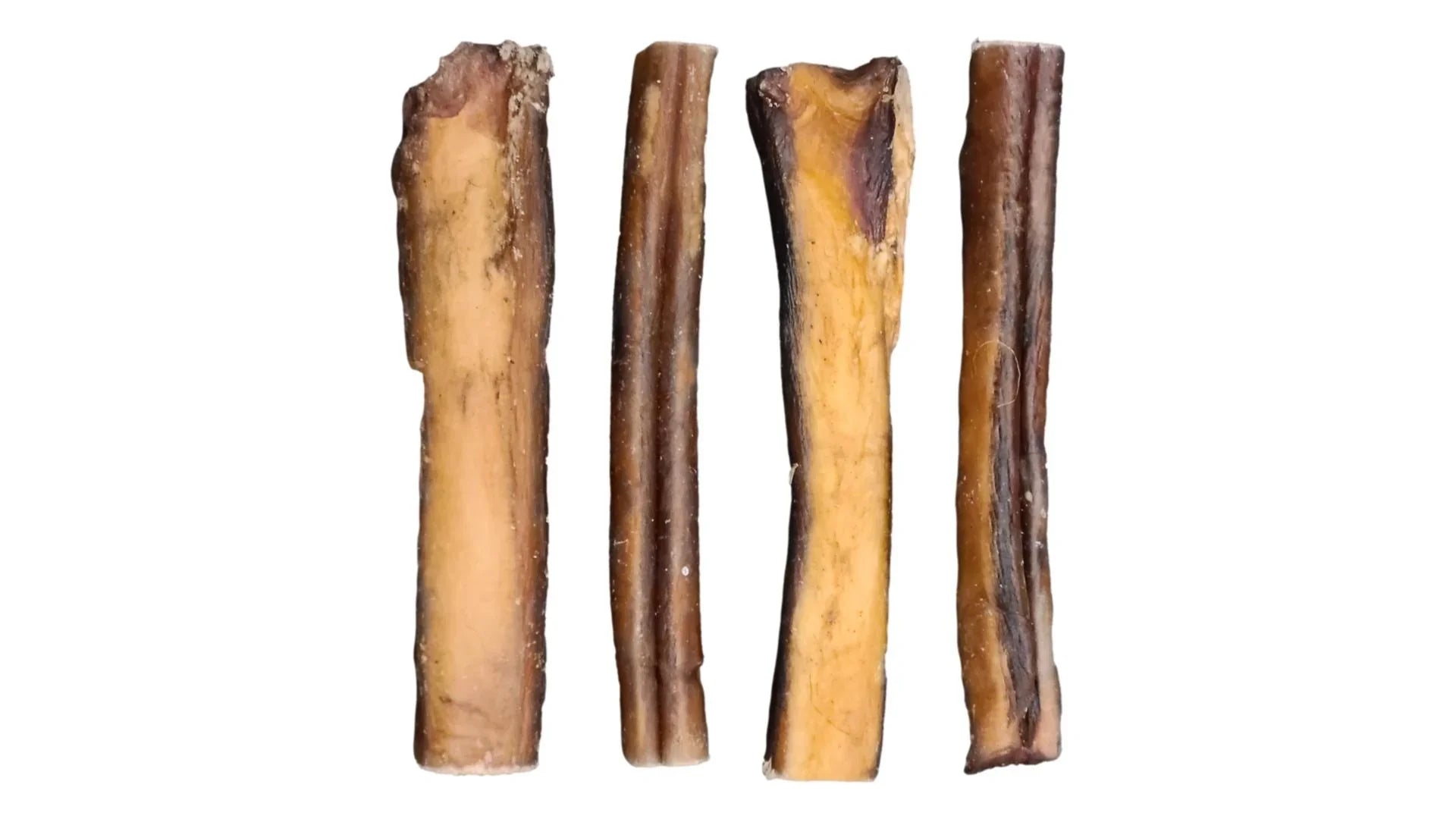 Four large natural bully sticks for dogs on a white background