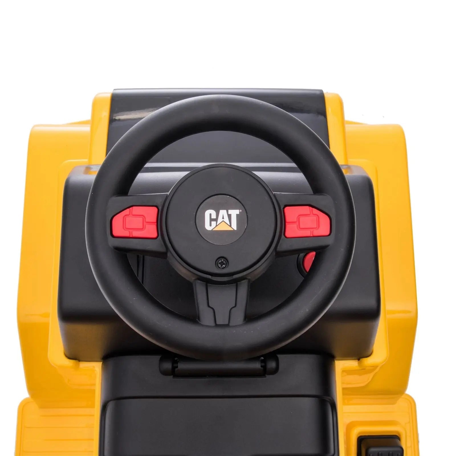 Yellow ride-on toy dump truck with black steering wheel and red control buttons, CAT logo visible.
