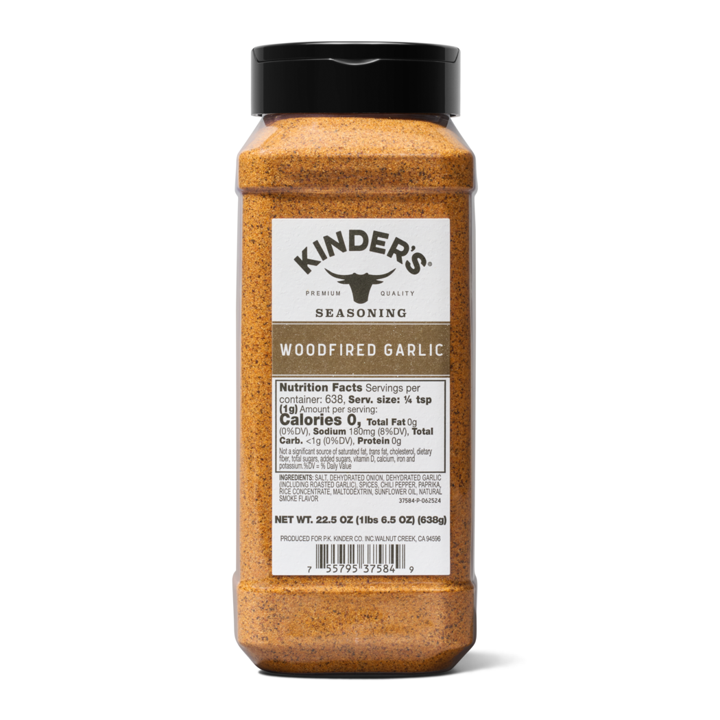 Bottle of Kinder's Woodfired Garlic seasoning on a white background