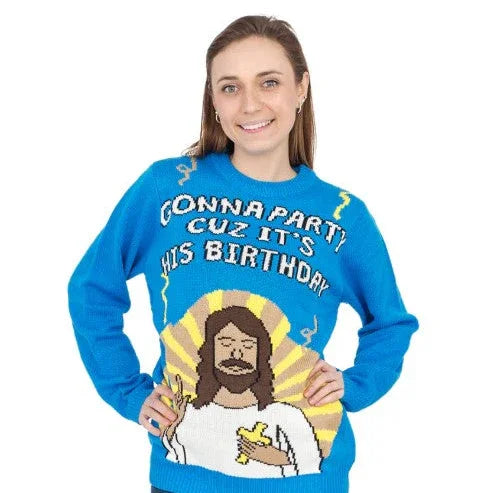 Woman wearing blue Jesus birthday party sweater with festive design and text