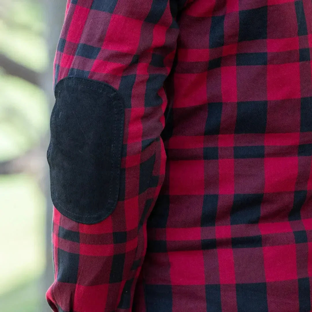 Red and black plaid men's armored flannel biker shirt with black elbow patch.