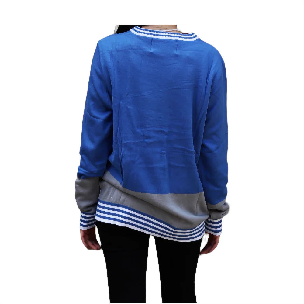 Back view of blue and gray striped sweater on woman, winter fashion apparel
