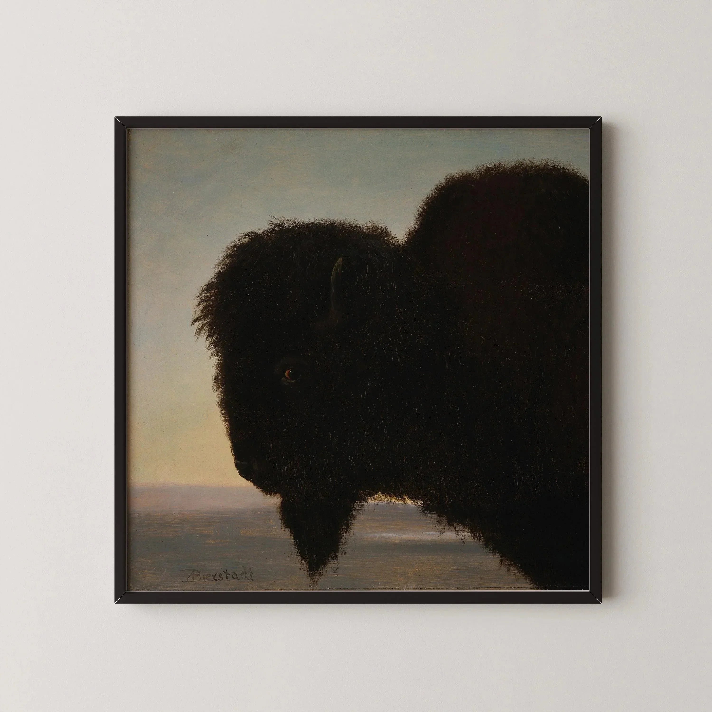 Vintage painting of a buffalo in profile, dark silhouette against a muted sky, framed art