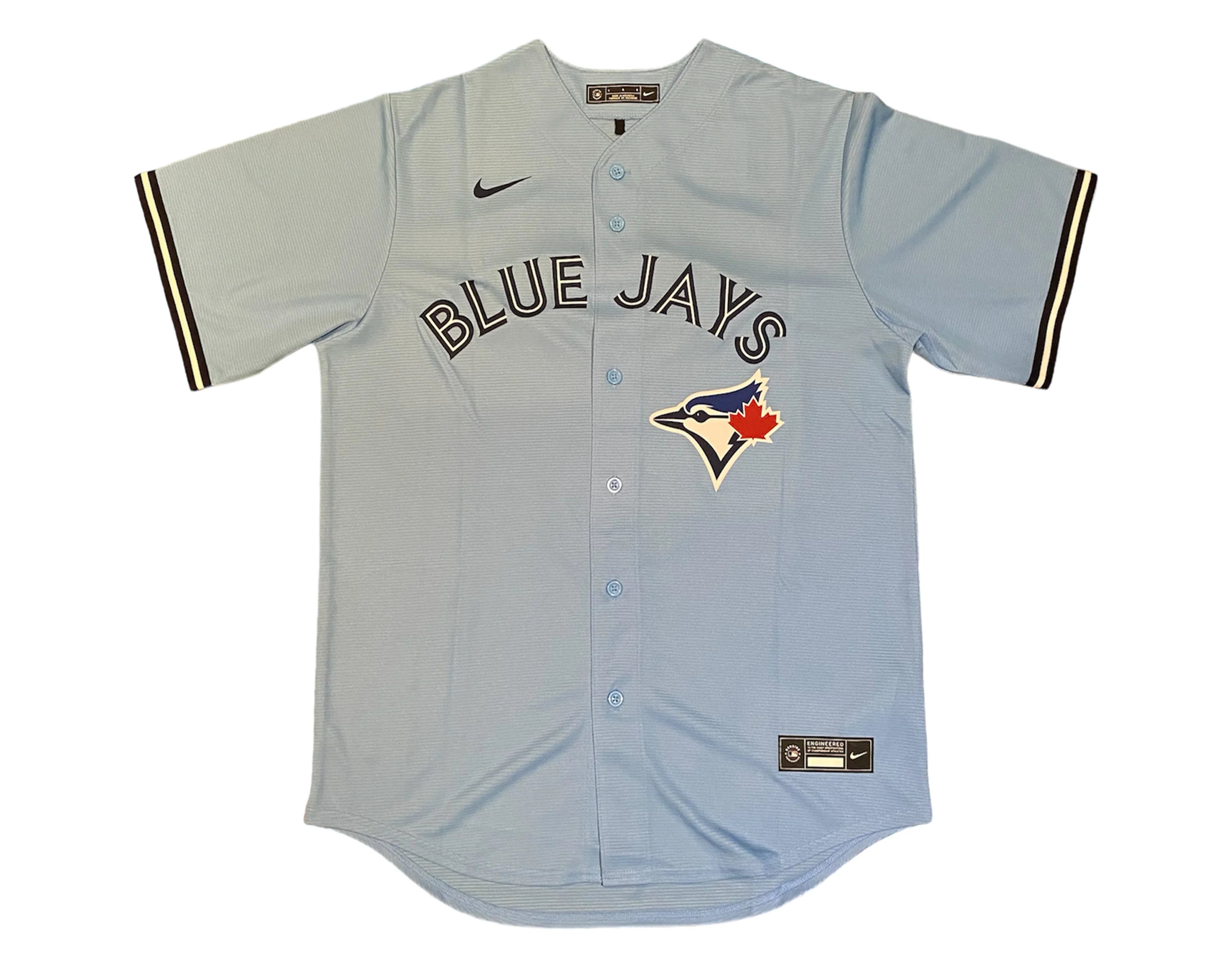 Toronto Blue Jays baby blue Nike baseball jersey with logo and black sleeve stripes
