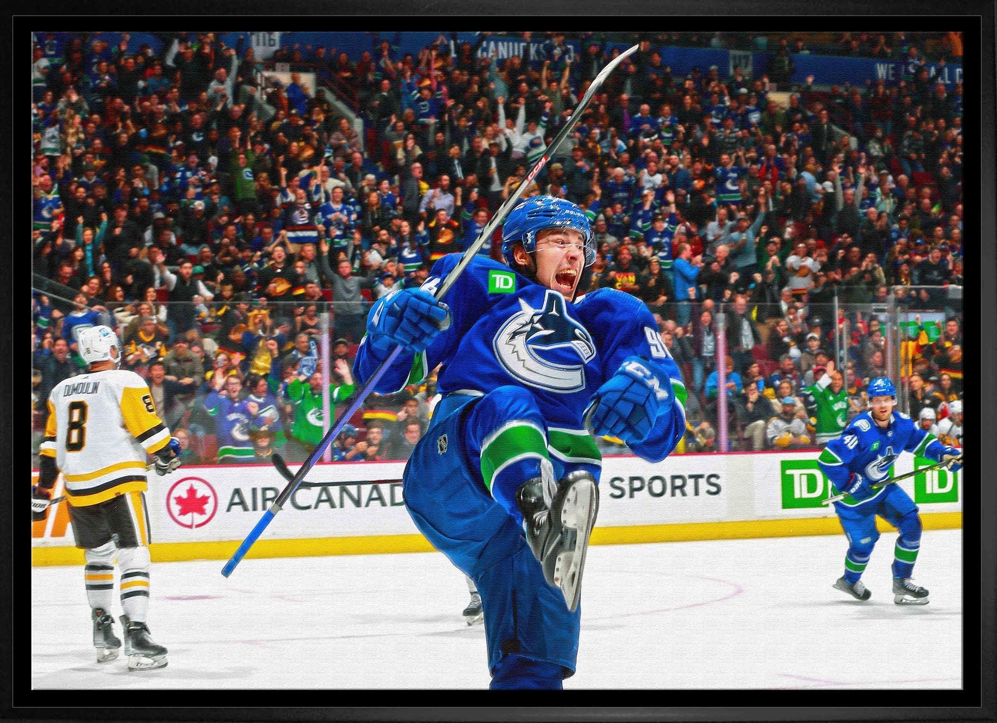 Vancouver Canucks hockey player celebrating a goal on ice rink with cheering crowd