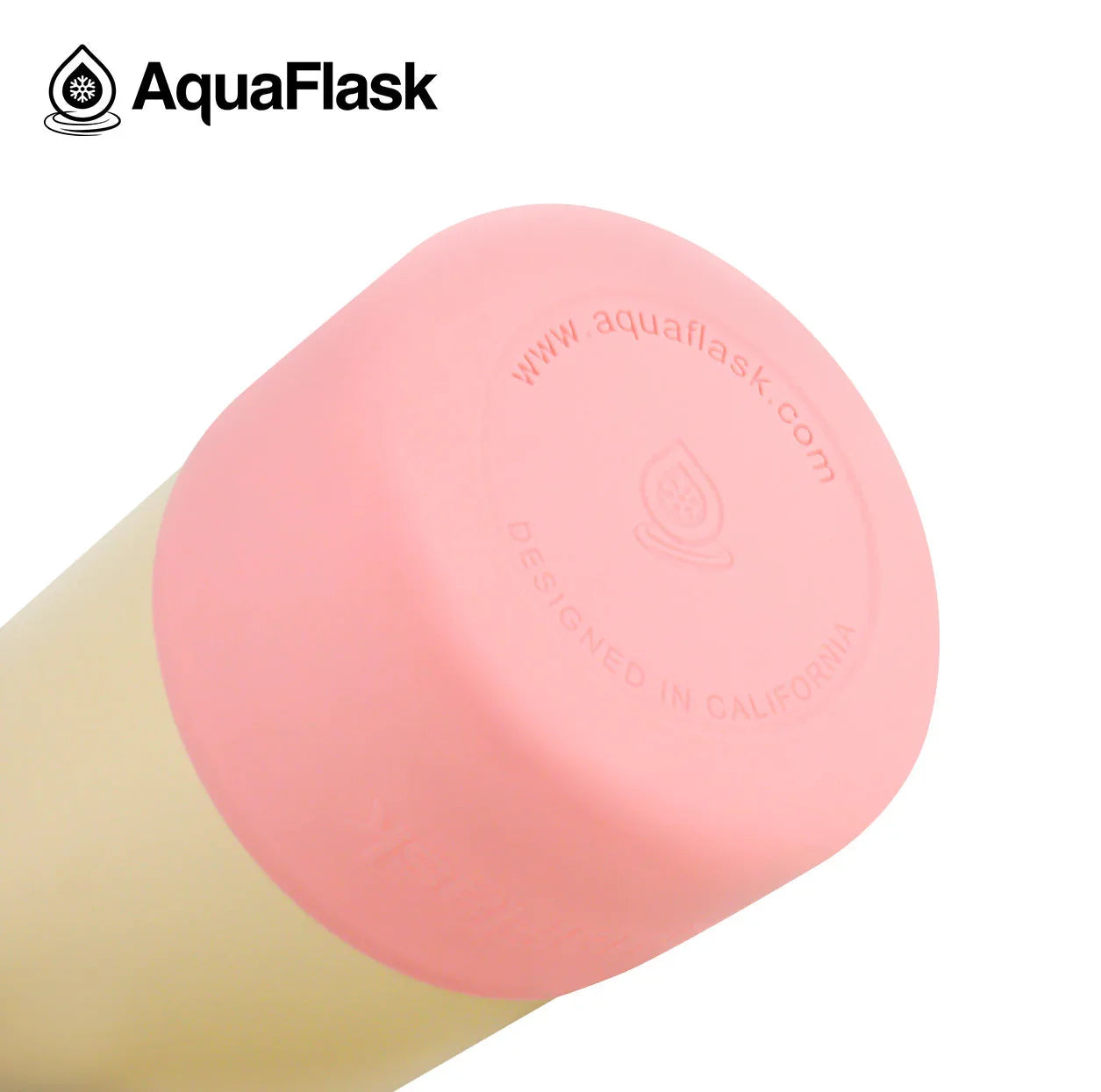 AquaFlask kids water bottle with pink lid and yellow body, close-up of cap.