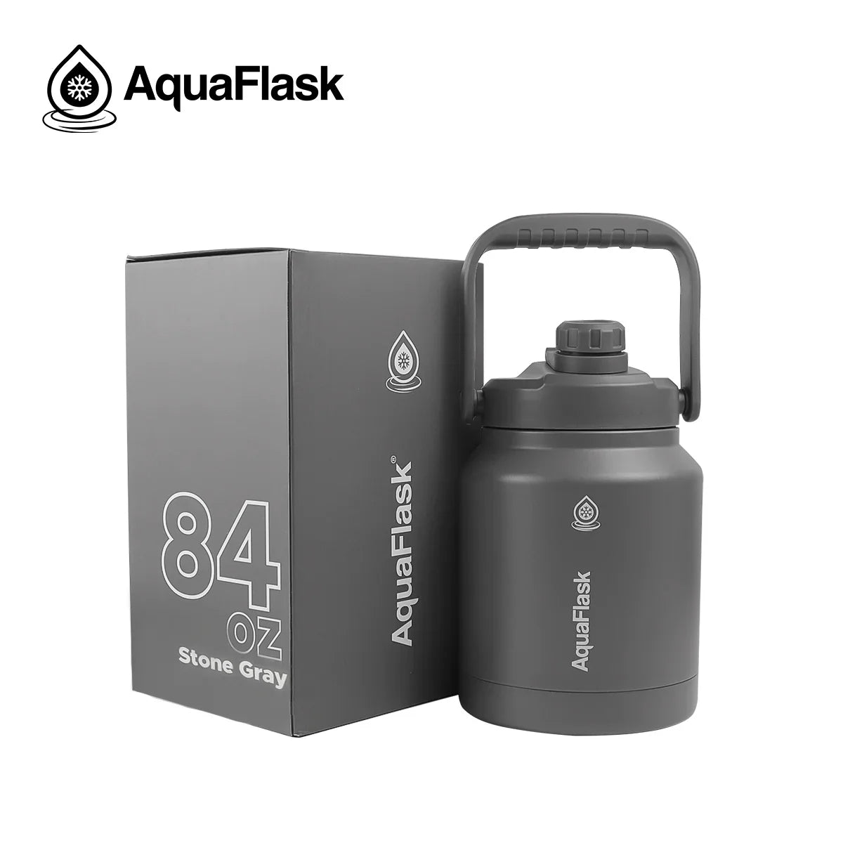 AquaFlask 84oz stone gray water jug with handle beside branded box