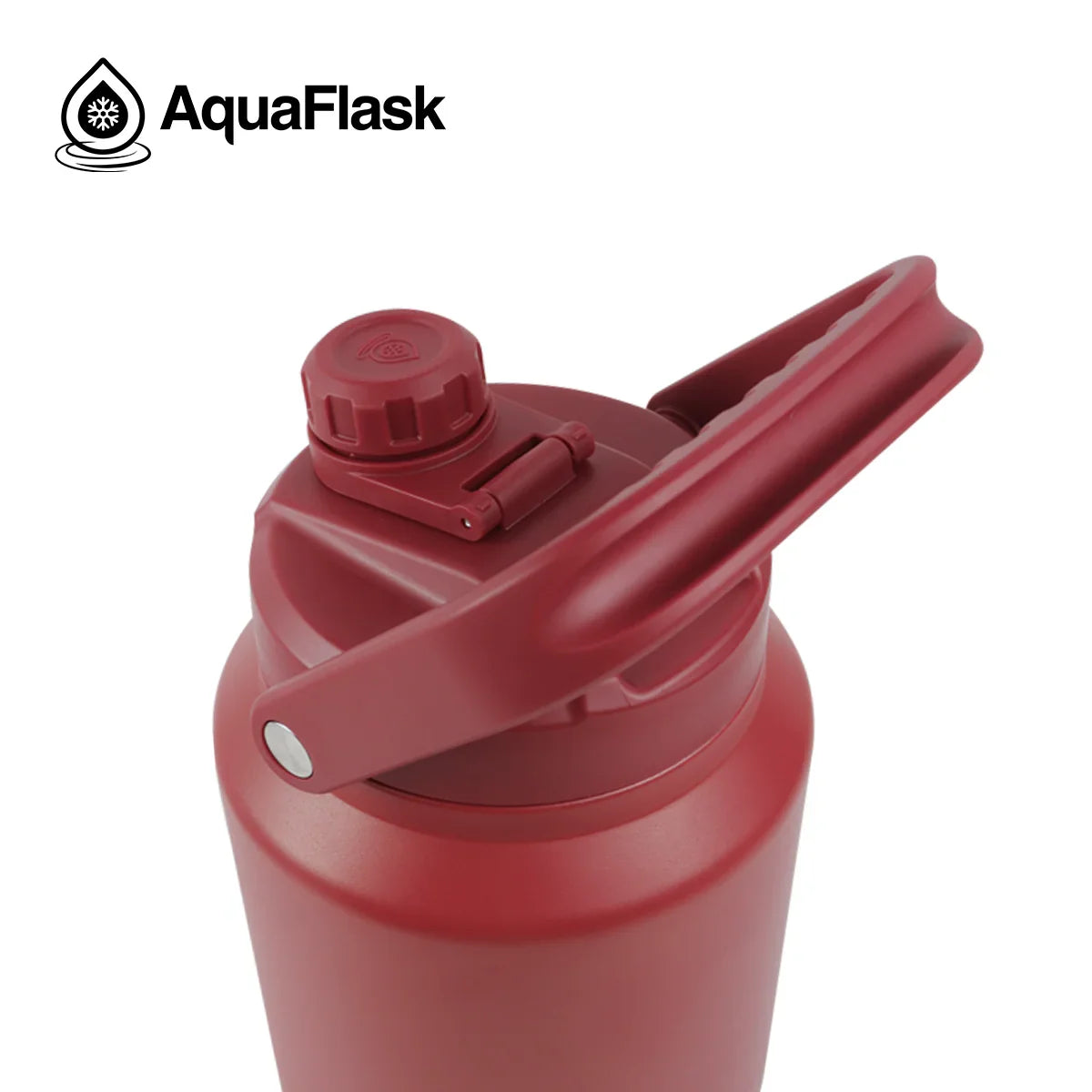 Red AquaFlask water bottle with handle and screw cap, close-up view