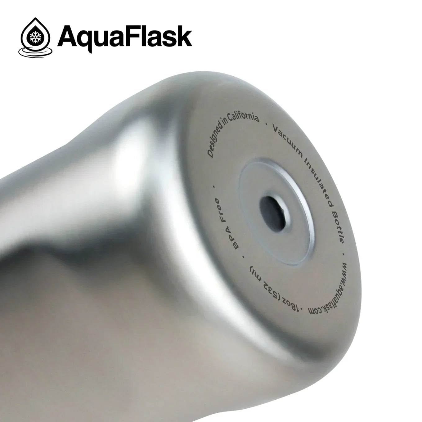 AquaFlask silver stainless steel 18oz vacuum insulated bottle close-up with logo