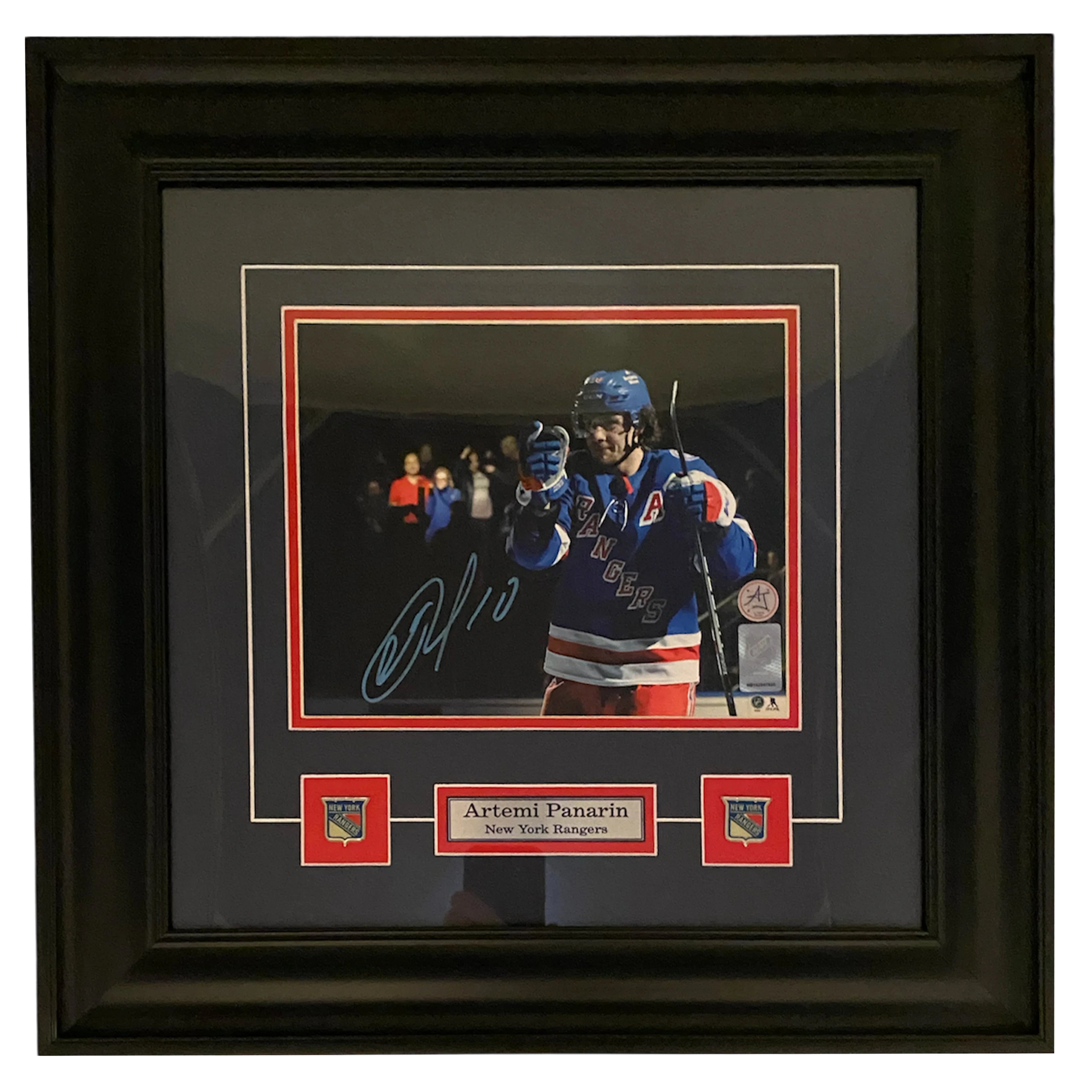 Framed signed photo of Artemi Panarin in New York Rangers hockey uniform display