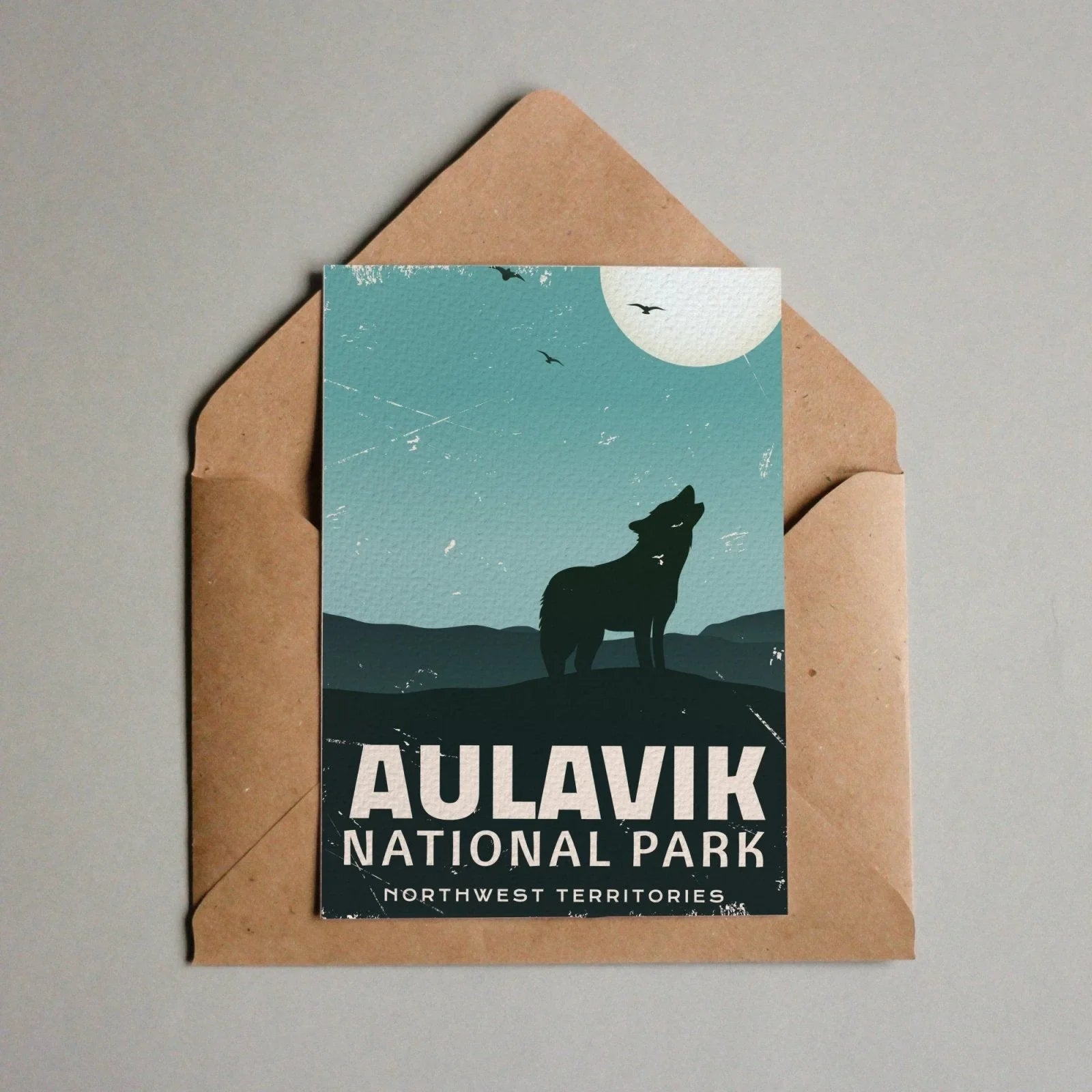 Aulavik National Park postcard with a howling wolf silhouette and moon, Northwest Territories