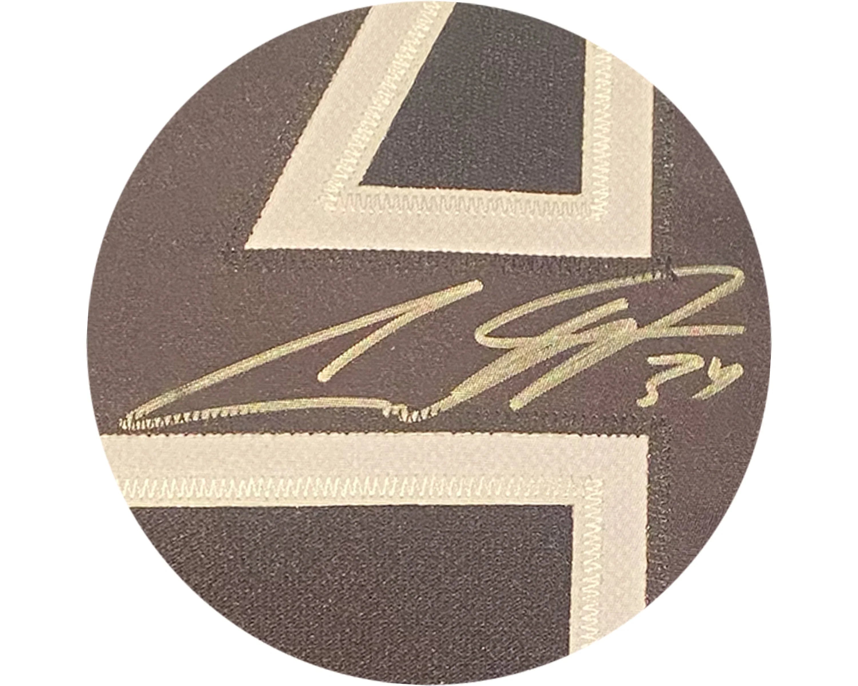 Gold autograph on black and white stitched sports jersey fabric, signed number 34