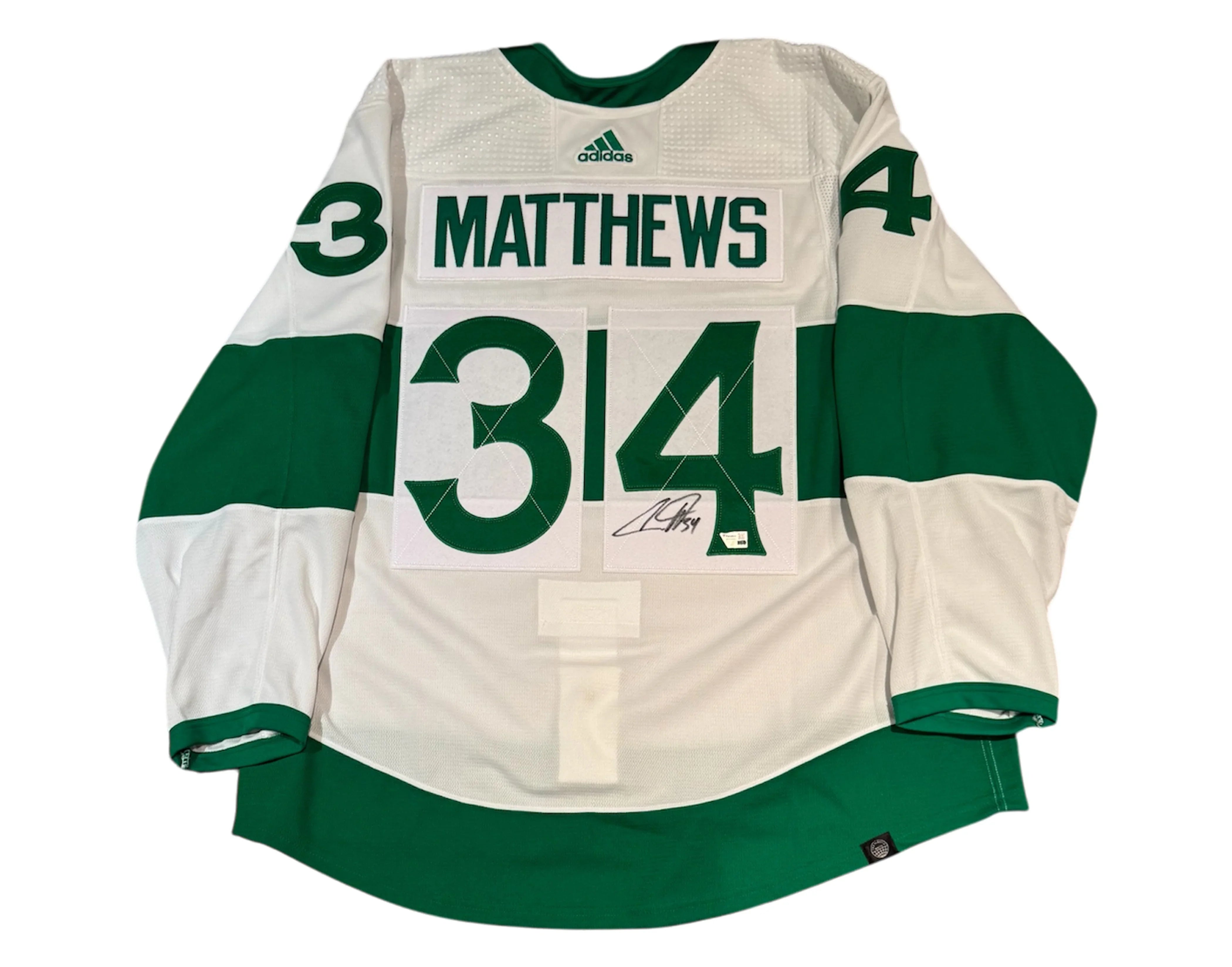 Signed Auston Matthews Toronto Maple Leafs green and white Adidas hockey jersey