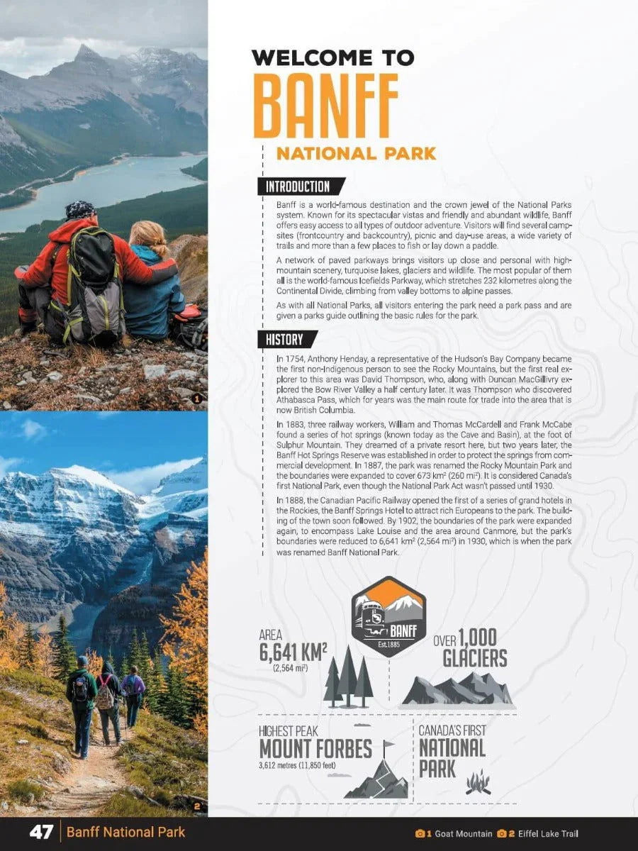 Hikers overlooking lake and mountains at Banff National Park, scenic Canadian Rockies.
