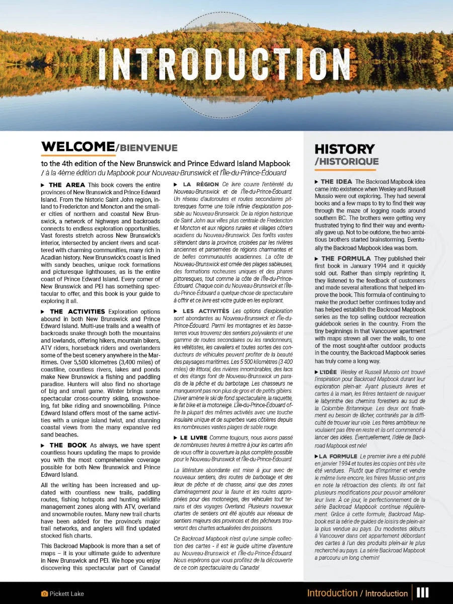 New Brunswick and PEI mapbook introduction page with lake and fall forest reflection