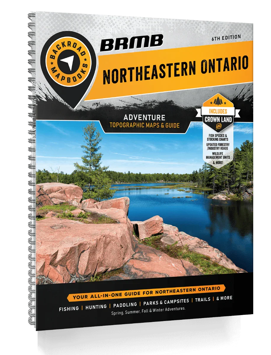 Northeastern Ontario Backroad Mapbook cover with rocky lake scene and outdoor adventure guide text