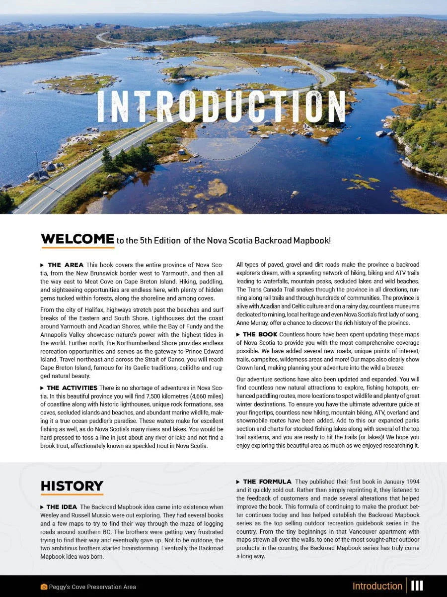 Nova Scotia Backroad Mapbook introduction page with aerial view of winding road and blue lakes