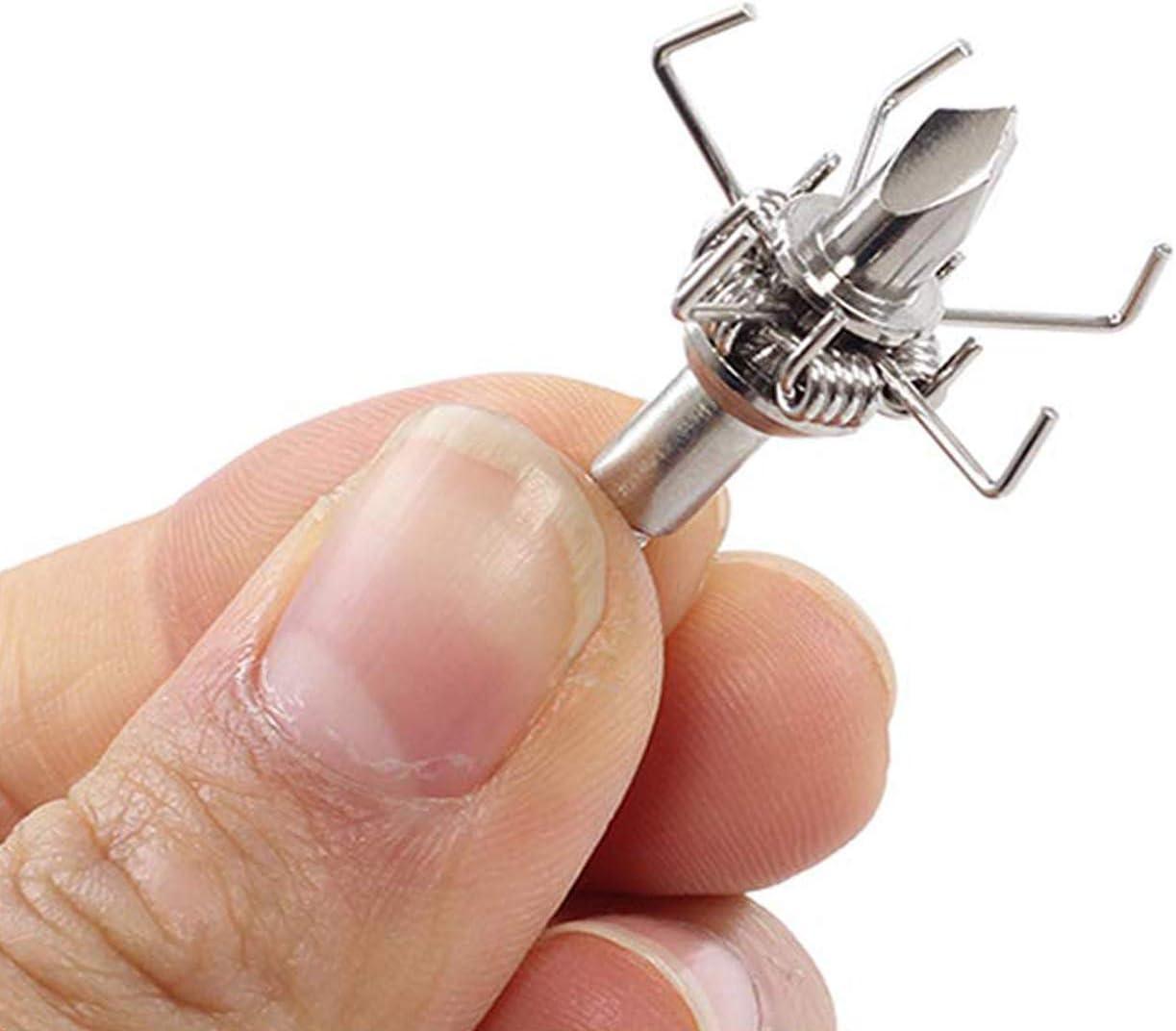 Hand holding a metallic archery small game hunting broadhead point with wire prongs